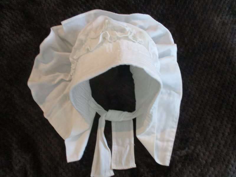 An unusual find - a Voortrekker/Volkspele `kappie` to display (or wear in the garden on a hot day)