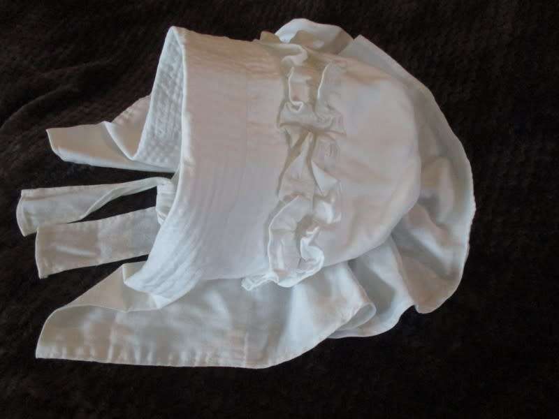 An unusual find - a Voortrekker/Volkspele `kappie` to display (or wear in the garden on a hot day)