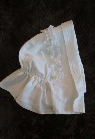 An unusual find - a Voortrekker/Volkspele `kappie` to display (or wear in the garden on a hot day)