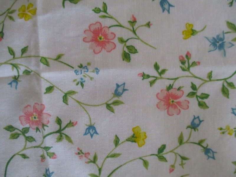 Eight pretty Laura Ashley-like floral cloths with lace borders