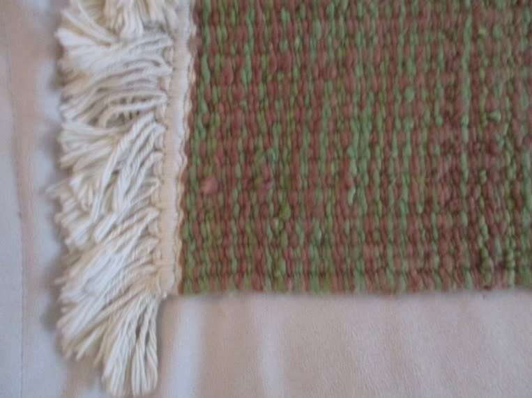 A  smaller, good quality woven wool rug