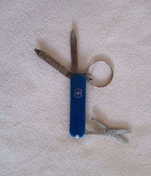 Three small vintage Victorinox Swiss Army Knives