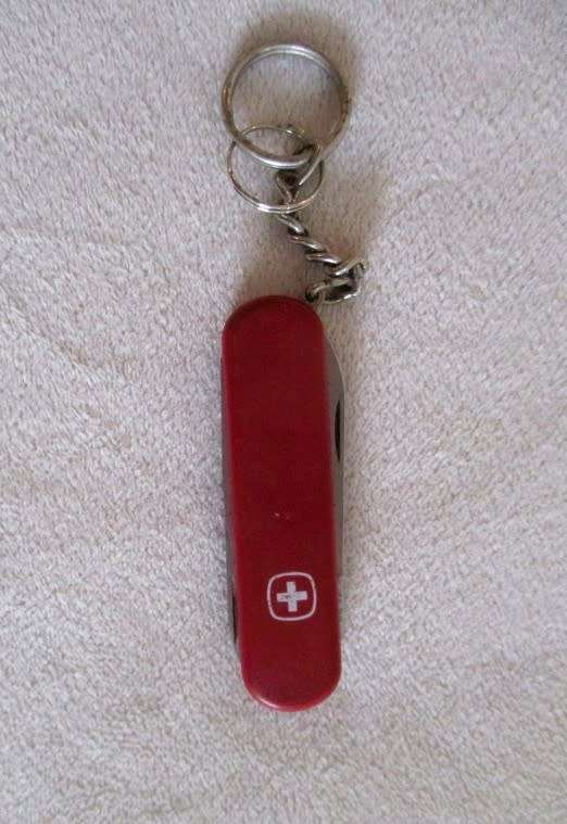 Three small vintage Victorinox Swiss Army Knives