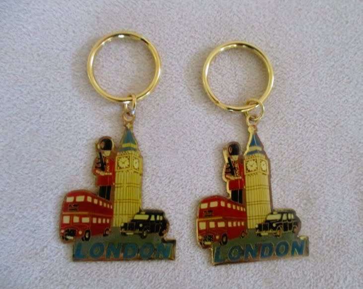 A lot of twelve interesting keyrings - perfume bottle, knife, mini tools, castanets etc