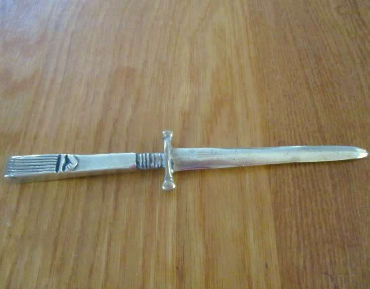 Vintage, ornate solid brass letter opener shaped like dagger
