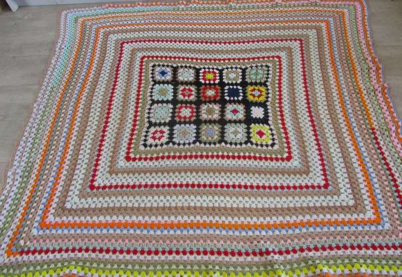 A hand crocheted wool blanket with soft colours - 190cm x 176cm