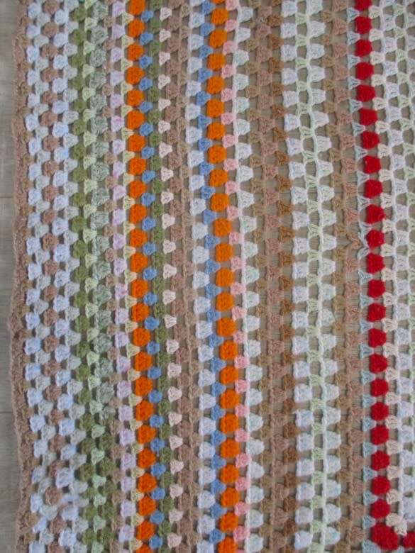 A hand crocheted wool blanket with soft colours - 190cm x 176cm
