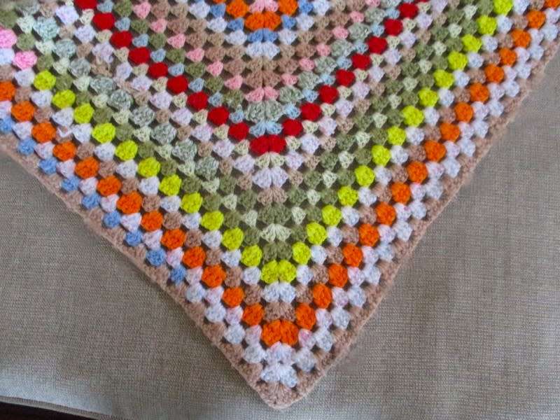A hand crocheted wool blanket with soft colours - 190cm x 176cm