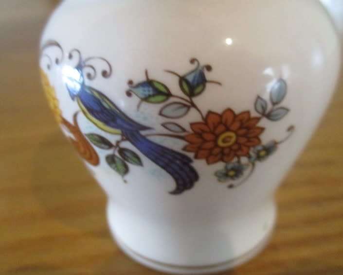 A small vintage 1950's/60's Sadler, England lidded jar with floral and bird design