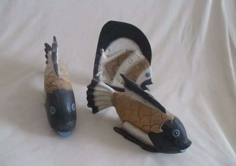 Three large hand carved and painted wooden fish