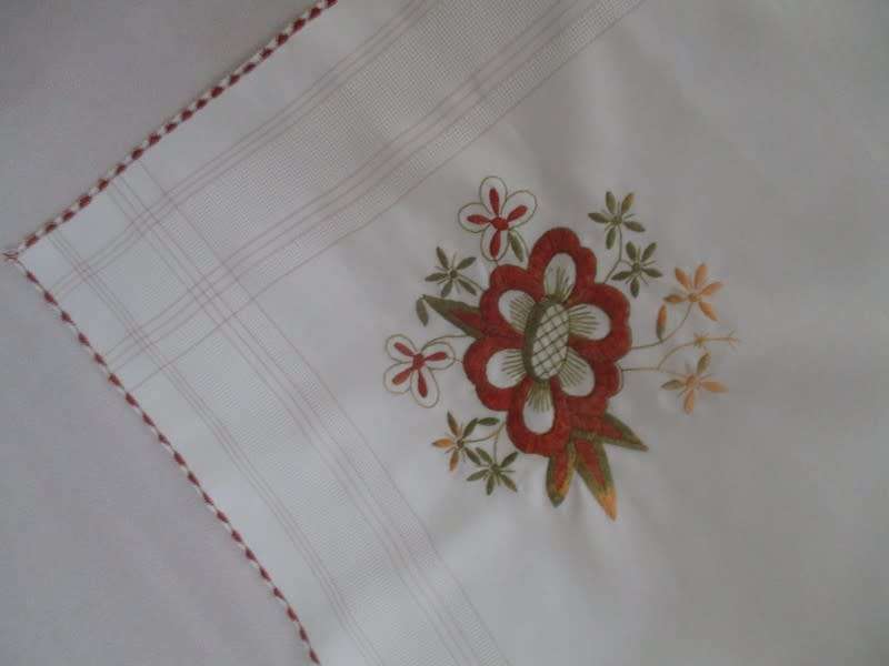 A smaller size square hand embroidered table cloth