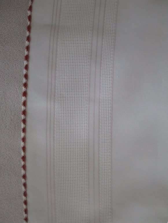 A smaller size square hand embroidered table cloth
