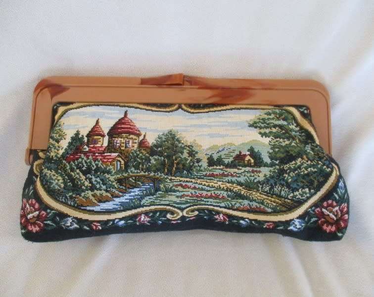 An exceptionally beautiful long vintage petit point tapestry clutch bag bag with bakelite handles