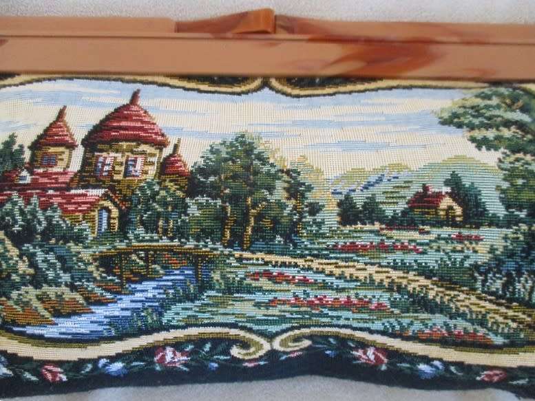 An exceptionally beautiful long vintage petit point tapestry clutch bag bag with bakelite handles