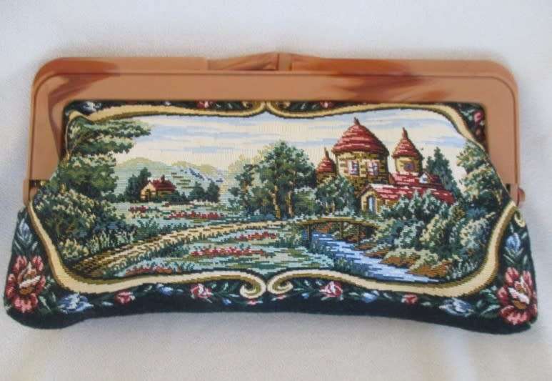 An exceptionally beautiful long vintage petit point tapestry clutch bag bag with bakelite handles