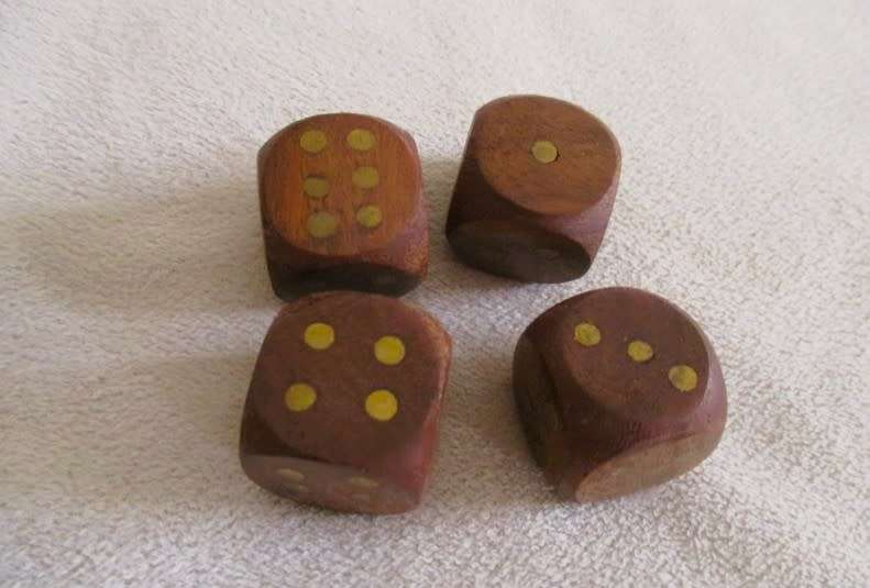 A very well made solid wood and brass domino set with four wooden die