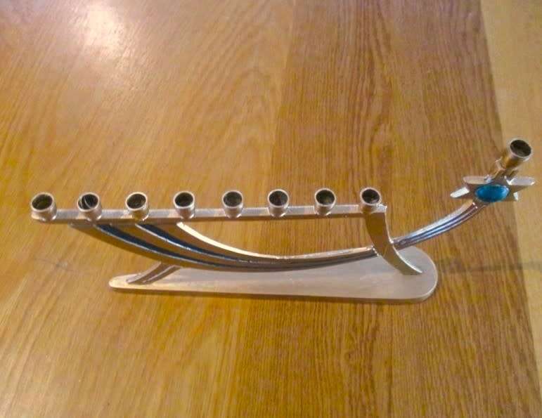 A small vintage Hanukkah Menorah made in Israel - 9 candles