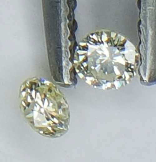 Two (+\-) 0.06 pointers round brilliant cut diamonds Colour ( M) not graded One Diamond per bid