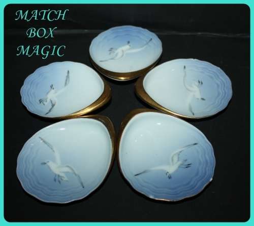 LOVELY SET OF FIVE OYSTER DISHES MADE IN DENMARK IN SHAPE OF SHELL DECORATED WITH A SEAGULL (D)