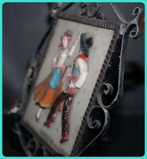 VINTAGE SOUVENIR PLAQUE WITH METAL DETAIL FRAME DEPICTING TWO DANCERS RAISED DESIGN