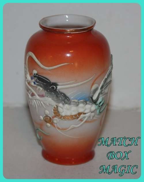 SMALL ORIENTAL POSY VASE WITH RAISED DESIGN OF A DRAGON