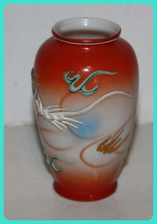 SMALL ORIENTAL POSY VASE WITH RAISED DESIGN OF A DRAGON