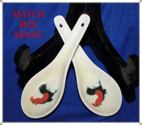 TWO CLASSIC PORCELAIN ORIENTAL SPOONS DECORATED WITH A ROOSTER
