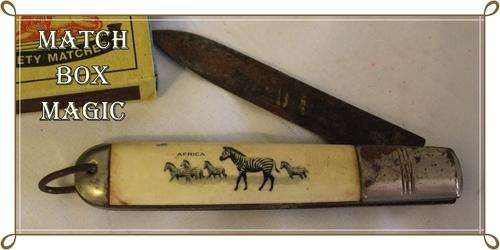 OLD POCKET KNIFE HANDLE DECORATED WITH SCENE OF ZEBRA AND WORD AFRICA -NOTE PICS FOR CONDITION