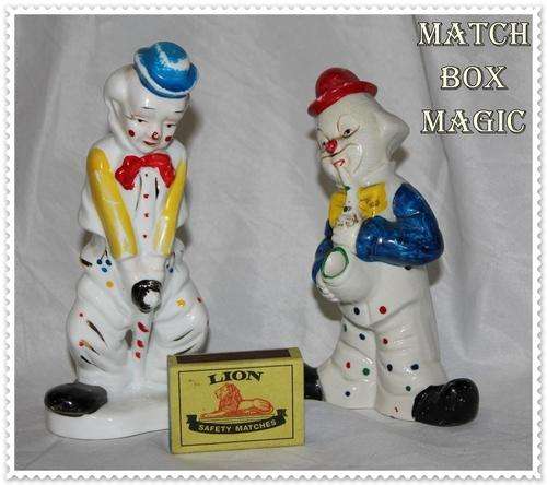 TWO CLOWN FIGURINES