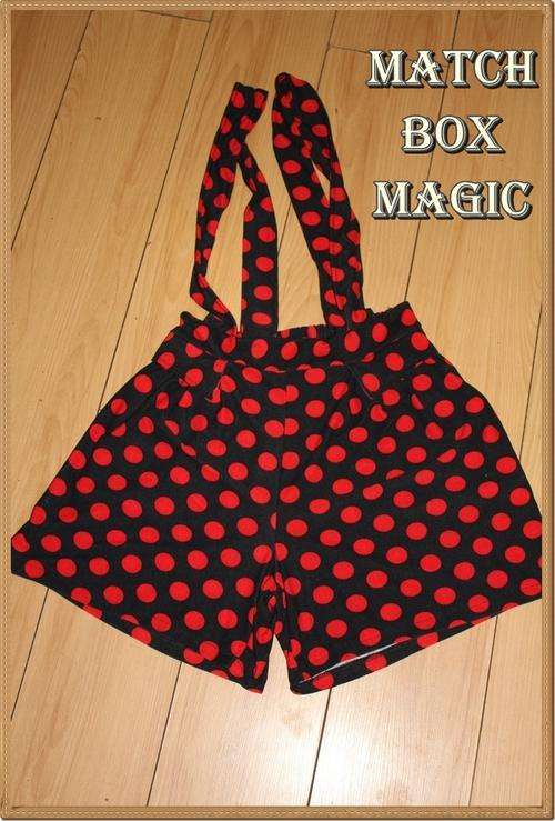 FUN PAIR OF BLACK AND RED POLKA DOT SHORTS WITH ATTACHED BRACES PERFECT FOR LADYBUG FANCY DRESS OUTF