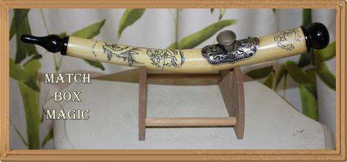 DECORATIVE ORIENTAL OPIUM PIPE I THINK ITS MADE OF BONE  STAND INCLUDED