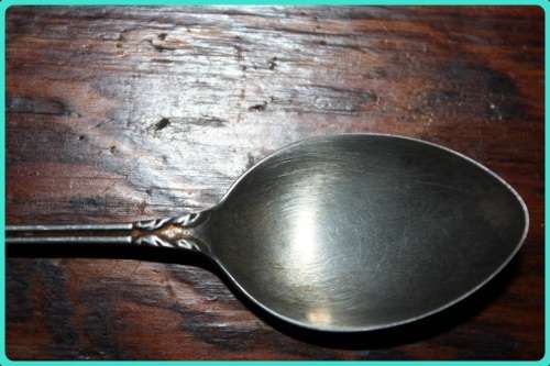 UNUSUAL TEASPOON DEPICTS A BEAR WITH BERLIN WRITTEN UNDERNEATH HAS BACK STAMP TAKE A LOOK
