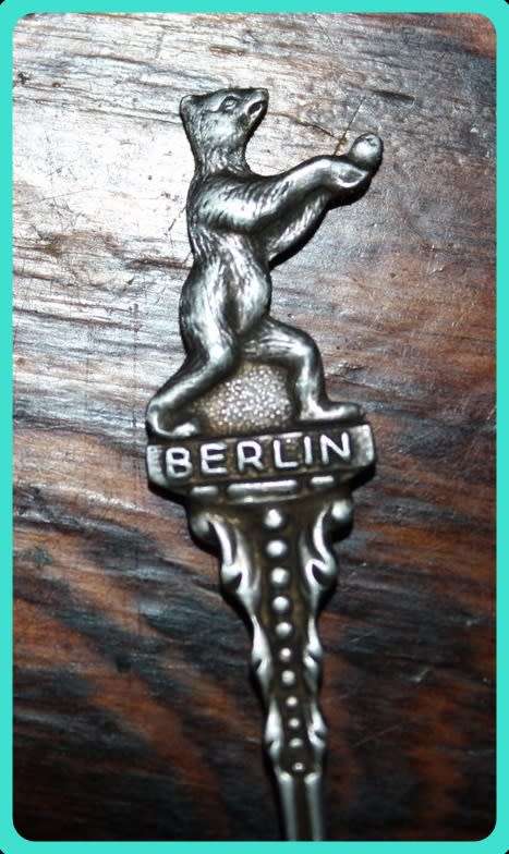 UNUSUAL TEASPOON DEPICTS A BEAR WITH BERLIN WRITTEN UNDERNEATH HAS BACK STAMP TAKE A LOOK