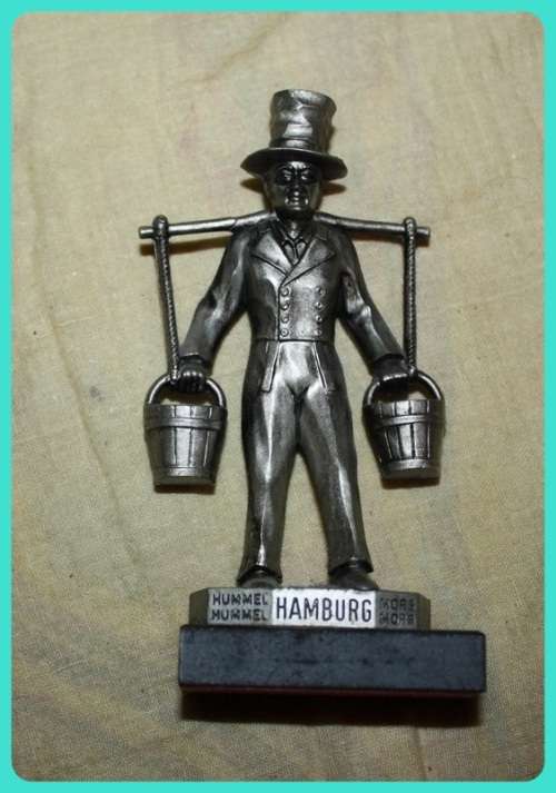 METAL STATUETTE MAN CARRYING BUCKETS HAMBURG ON BASE