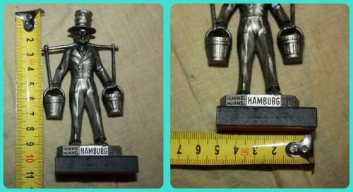METAL STATUETTE MAN CARRYING BUCKETS HAMBURG ON BASE