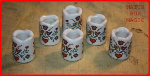 SET OF SIX VINTAGE WEST GERMAN CANDLE HOLDERS WITH AN ARTS AND CRAFTS THEME TO SWEET