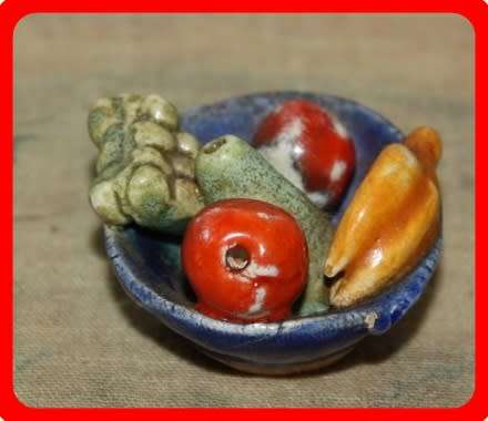 MINIATURE POTTERY FRUIT BOWL