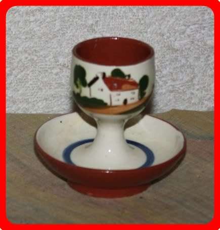 EGG CUP TORQUAY WARE  WATCOMBE  COTTAGE ON THE FRONT LAID TO DAY ON THE BACK FUN ITEM