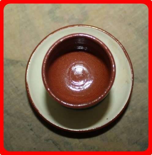 EGG CUP TORQUAY WARE  WATCOMBE  COTTAGE ON THE FRONT LAID TO DAY ON THE BACK FUN ITEM