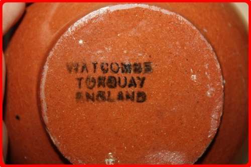 EGG CUP TORQUAY WARE  WATCOMBE  COTTAGE ON THE FRONT LAID TO DAY ON THE BACK FUN ITEM