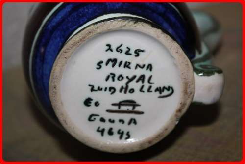 SMIRNA ROYAL ZUID HOLLAND GOUDA JUG HAND PAINTED WITH  ORIGINAL LABEL ON SIDE AND MAKERS MARK UNDERN