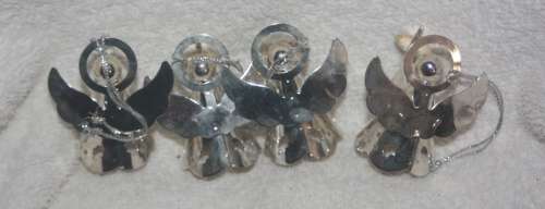 FOUR LOVELY SILVER METAL ANGELS PERFECT FOR YOUR CHRISTMAS TREE