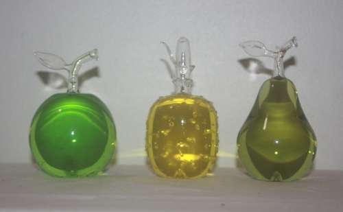 GLASS TRIO OF FRUIT FILLED WITH COLOURED LIQUID APPLE  PEAR AND PINEAPPLE
