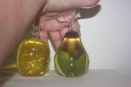 GLASS TRIO OF FRUIT FILLED WITH COLOURED LIQUID APPLE  PEAR AND PINEAPPLE
