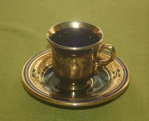 VINTAGE BLUE AND GOLD GREEK CUP AND SAUCER