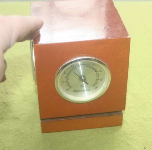 SPINNING DESK CLOCK HYGROMETER  THERMOMETER MARKED CCAL  1948  1998 UNUSUAL  MANTIQUE
