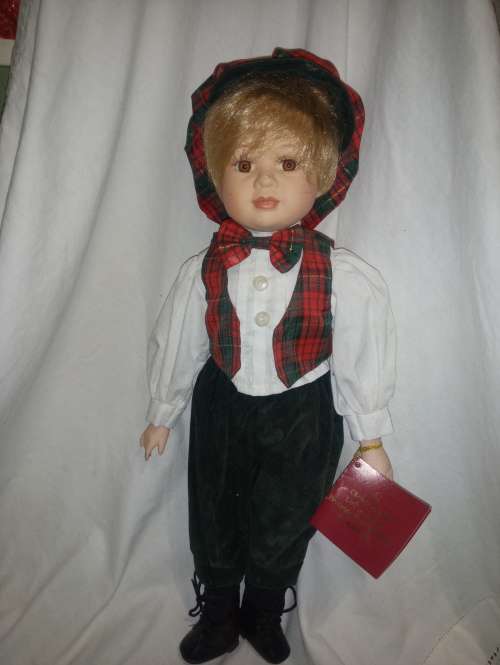 The Christmas 1999 limited edition porcelain doll collection by H Samuel