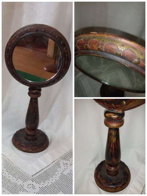 Upright wooden shaving mirror with metalwork decorative detail