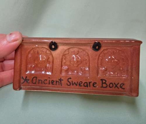 Novelty porcelain money box. Ye ancient sweare boxe