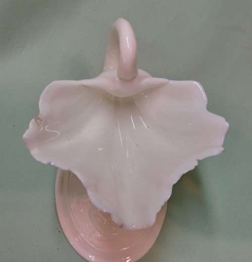 Royal Wocester dolphin supporting a clam shell ornament
